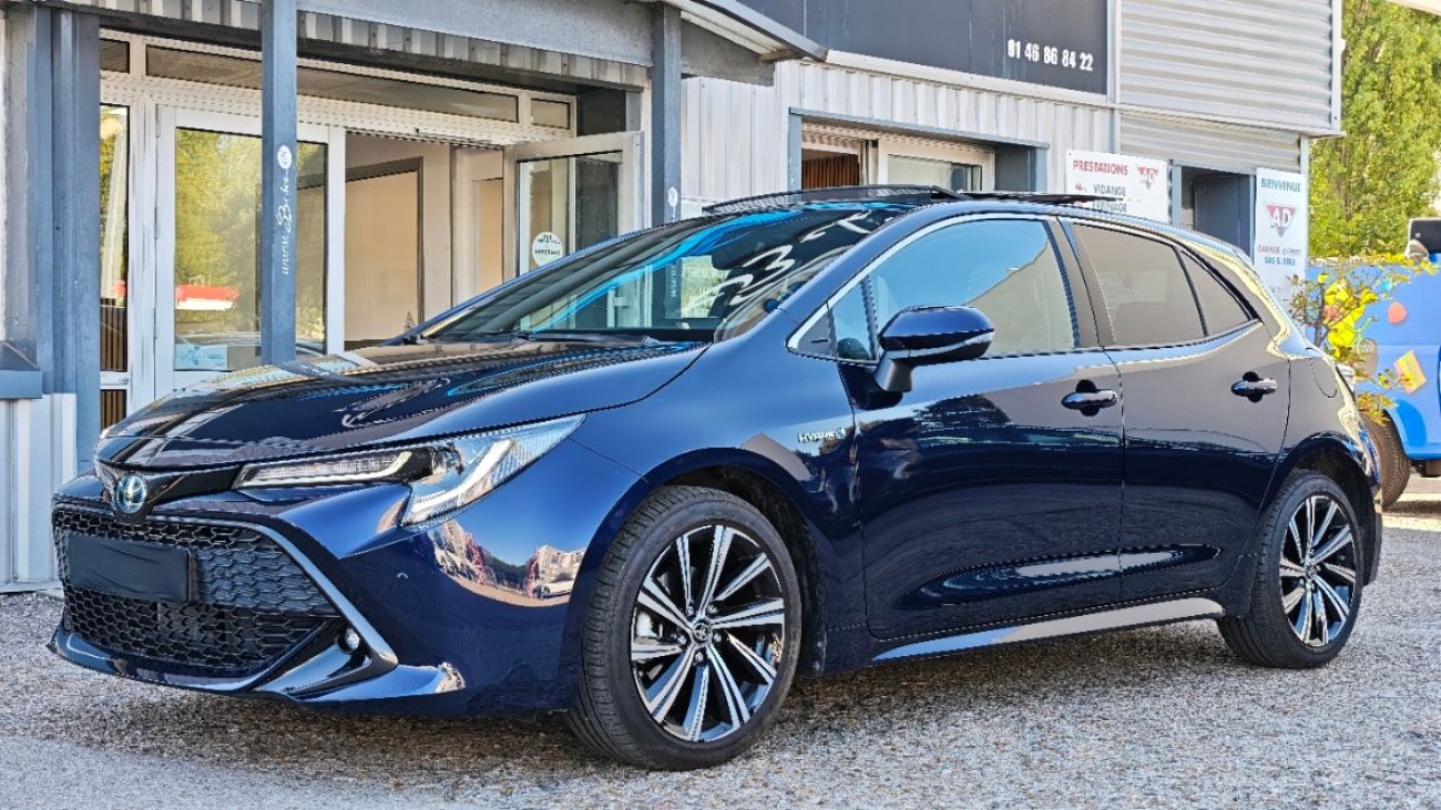 Mandataire TOYOTA COROLLA HYBRIDE MY20 122h Design TOIT OUVRANT 1ERE MAIN