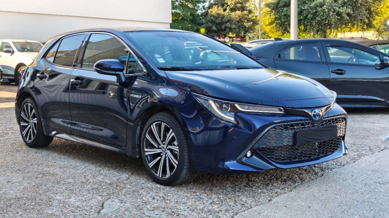 Mandataire TOYOTA COROLLA HYBRIDE MY20 122h Design TOIT OUVRANT 1ERE MAIN