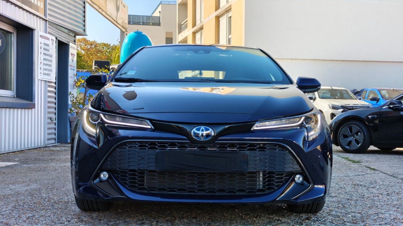 Mandataire TOYOTA COROLLA HYBRIDE MY20 122h Design TOIT OUVRANT 1ERE MAIN